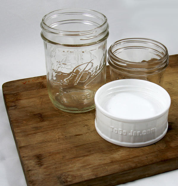 togojar connector on a cutting board with two mason jars